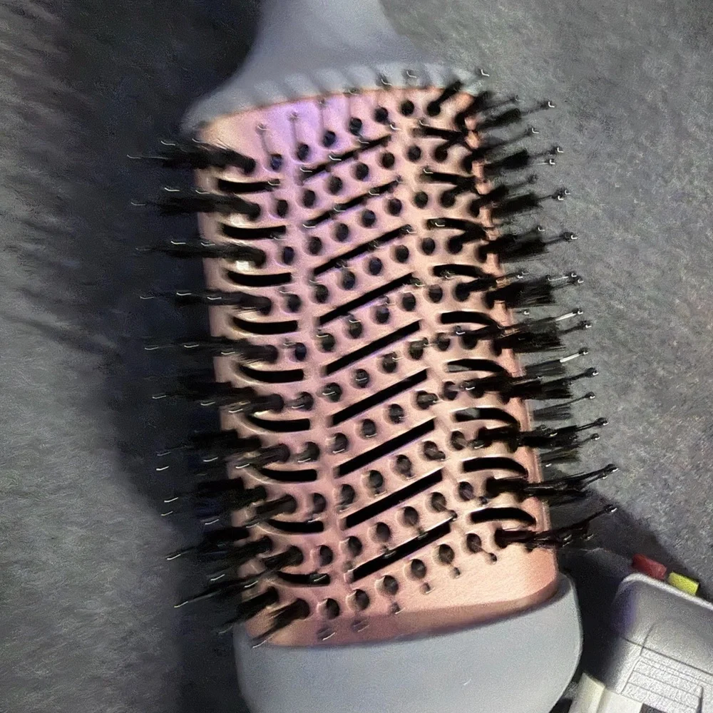 Sleek Pink and Gray Hair Dryer Brush